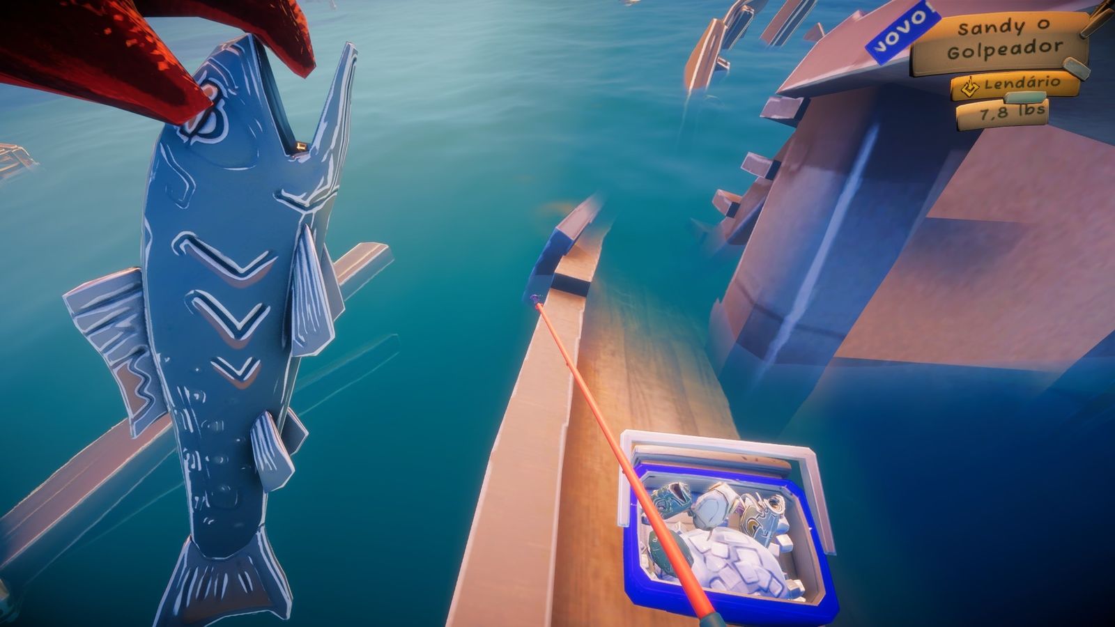 A landed catch held up on the dock at night